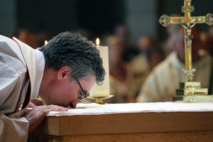 Why do Priests kiss the Altar?.